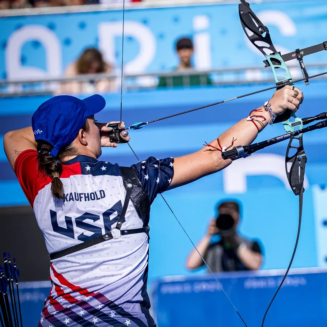 A Team USA archer competing in the Olympic jersey designed by Shelby Klein